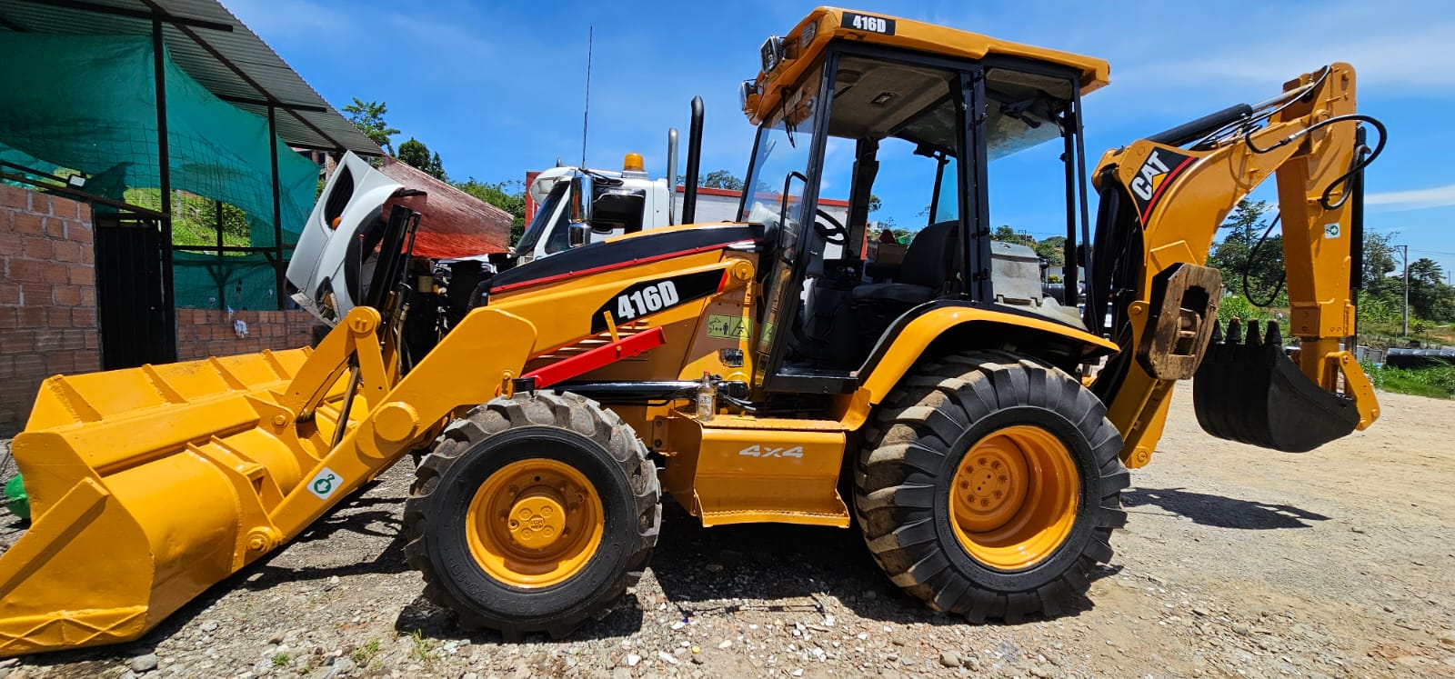 excelente retroescavadora